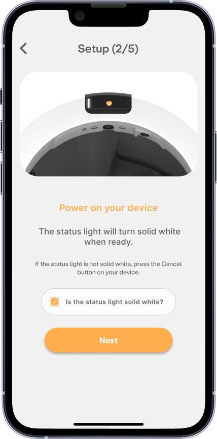 In-app setup step 2 to power on Litter-Robot. The status light will turn solid white when ready. If the status light is not solid white, press the Cancel button on your device.