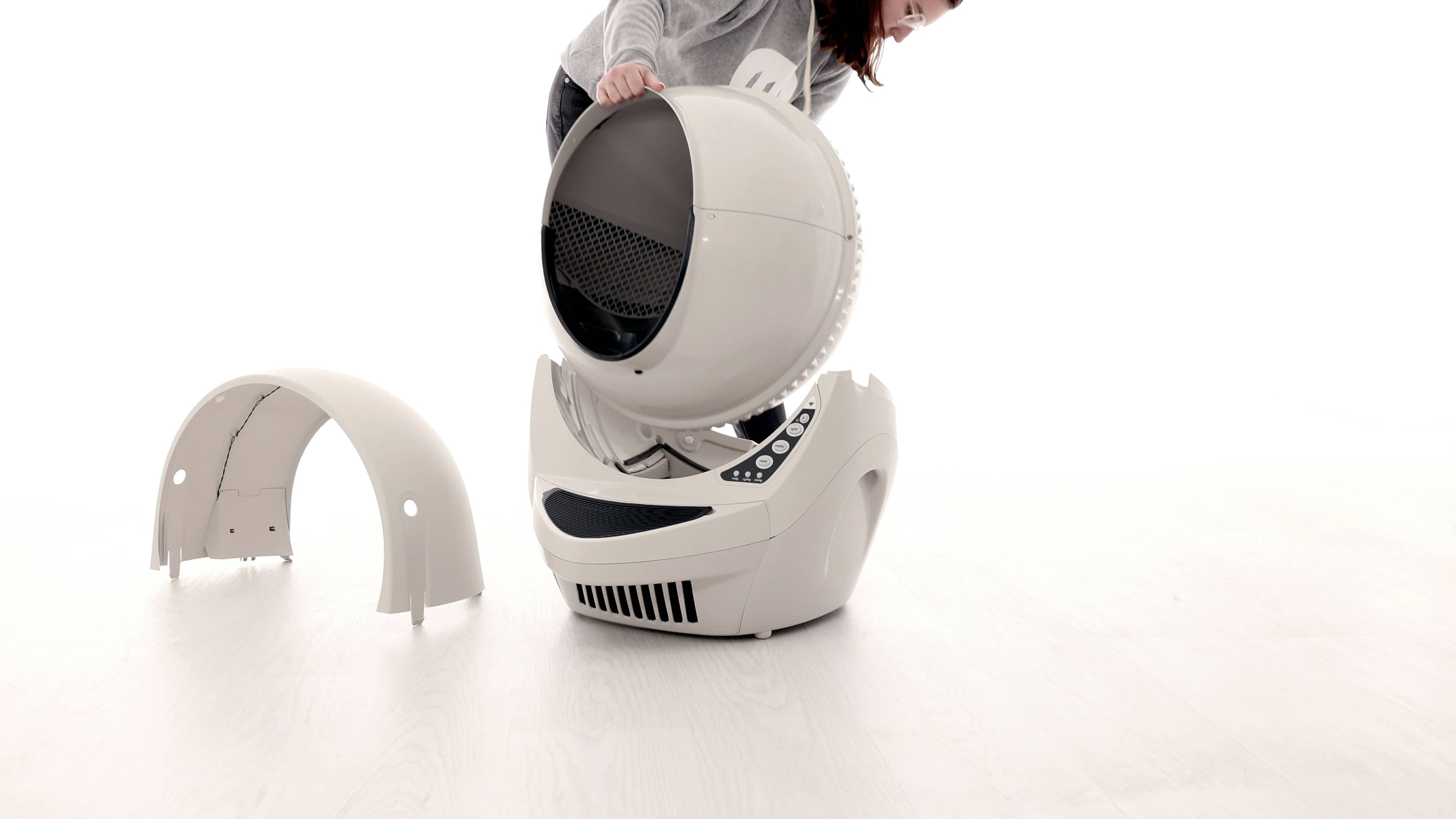 Removing the Litter-Robot 3 globe from the unit